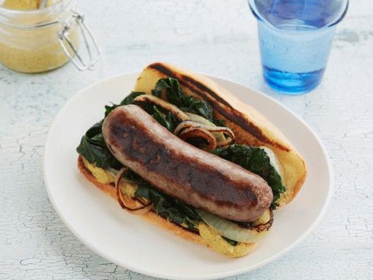 Foto Hot dog con salchichas Bratwurst y col rizada