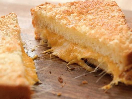 Foto Sandwich crujiente de queso caliente