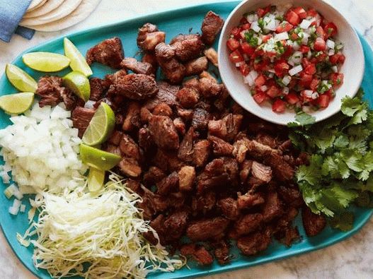 Foto de Karnitas en una olla de cocción lenta