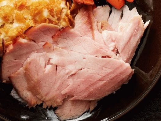 Foto Jamón de cerdo ahumado al horno con glaseado de miel y azúcar