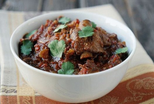 Foto de estofado de cabra en salsa de curry