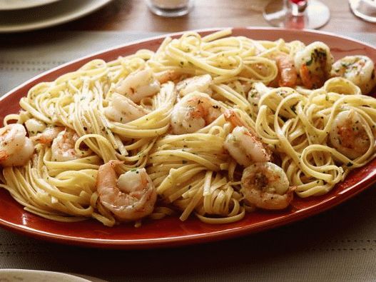 Foto Camarones al ajillo y salsa de limón con pasta