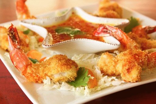 Foto de camarones de pan de coco con mermelada de naranja