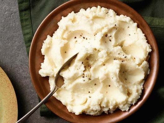 Platos de fotografía - Puré de papas en una olla de cocción lenta