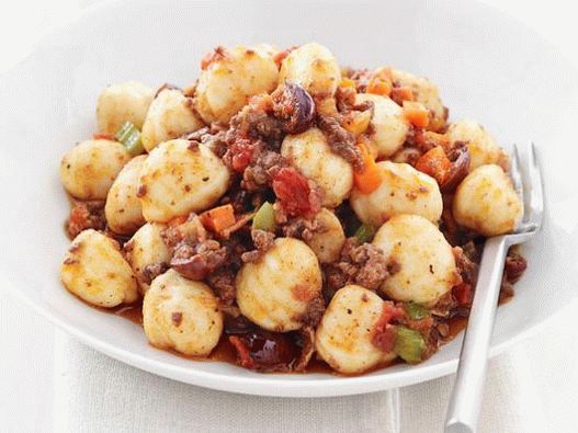 Foto de ñoquis en salsa de carne