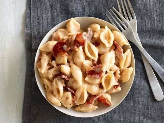 Foto Pasta increíblemente deliciosa con queso y tocino