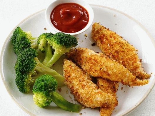 Alitas de pollo con guarnición de brócoli al vapor