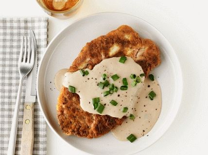 Foto de filete de ternera con salsa bechamel