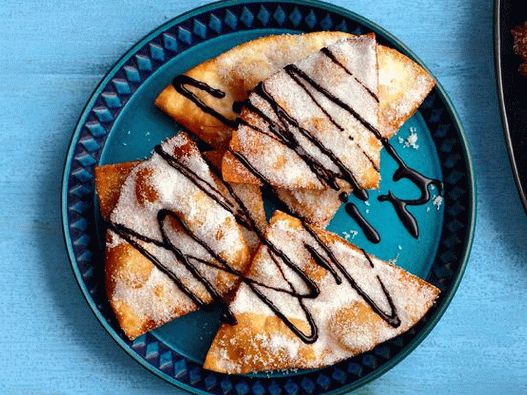 Foto Sopapiyas con salsa de chocolate