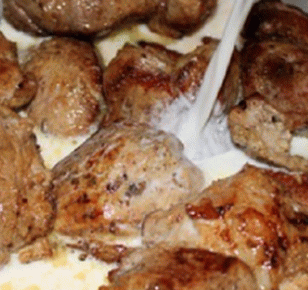 Conejo estofado en leche