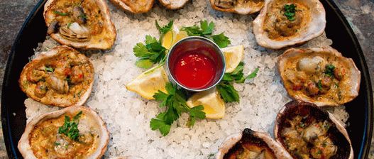 Foto de ostras a la parrilla con salsa Fra Diablo
