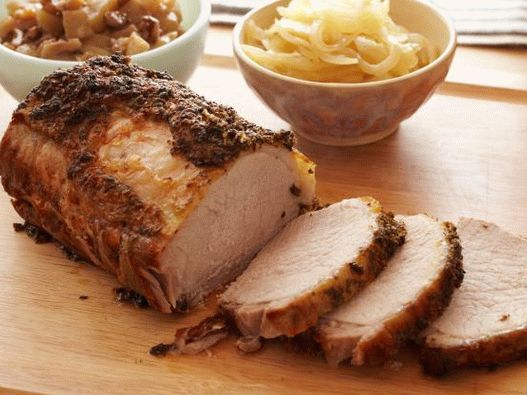 Foto de lomo de cerdo al horno en jugo de manzana y salsa de manzana